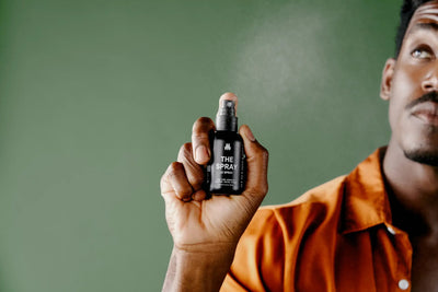 Man using Meridian's The Spray body deodorant 